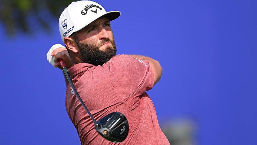 Jon Rahm swings