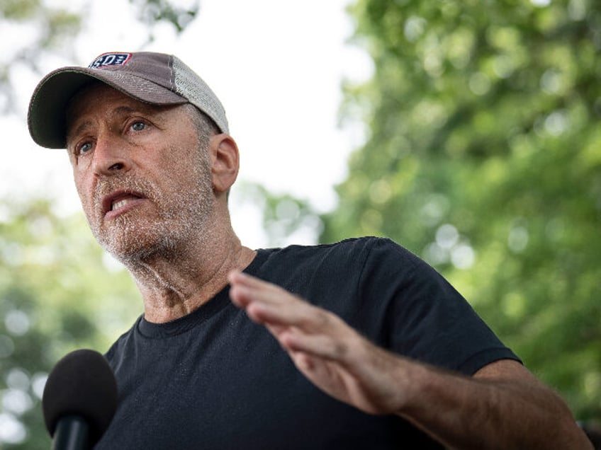 WASHINGTON, DC - JULY 28: Jon Stewart speaks to the press before a news conference about t