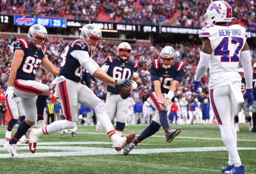 jones sparks patriots in bills nfl upset chiefs edge chargers