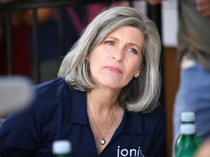 U.S. Senator Joni Ernst eating at Cattlemen's Beef Quarters at the Iowa State Fair in Des Moines, Iowa.