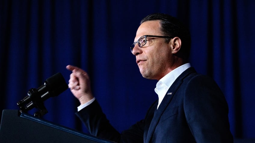 Josh Shapiro, governor of Pennsylvania, speaks during a campaign event with US President Joe Biden