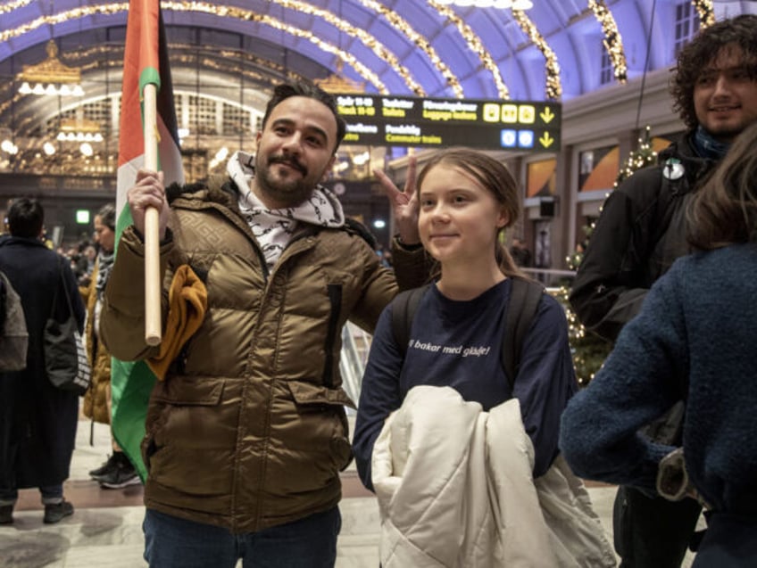 STOCKHOLM, SWEDEN, NOVEMBER 24: Climate activist Greta Thunberg (R) makes an appearance as pro-Palestinian supporters gather at Central Railway Station of Stockholm to demonstrate against Israeli attacks on Gaza as four-day truce between Israel and Hamas started in early morning, in Stockholm, Sweden, November 24, 2023. (Photo by Narciso Contreras/Anadolu …