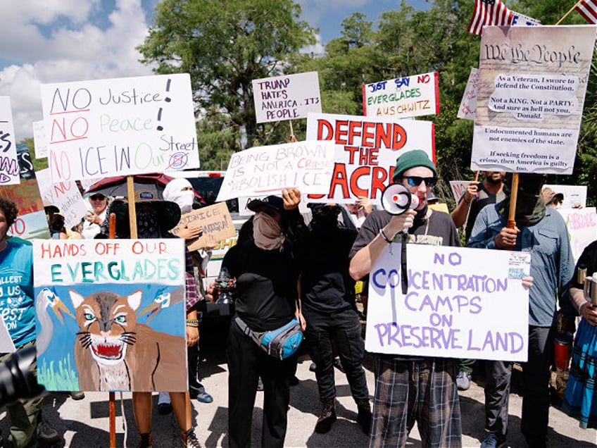 Demonstrators protest the construction of a detention center, nicknamed "Alligator Alcatra