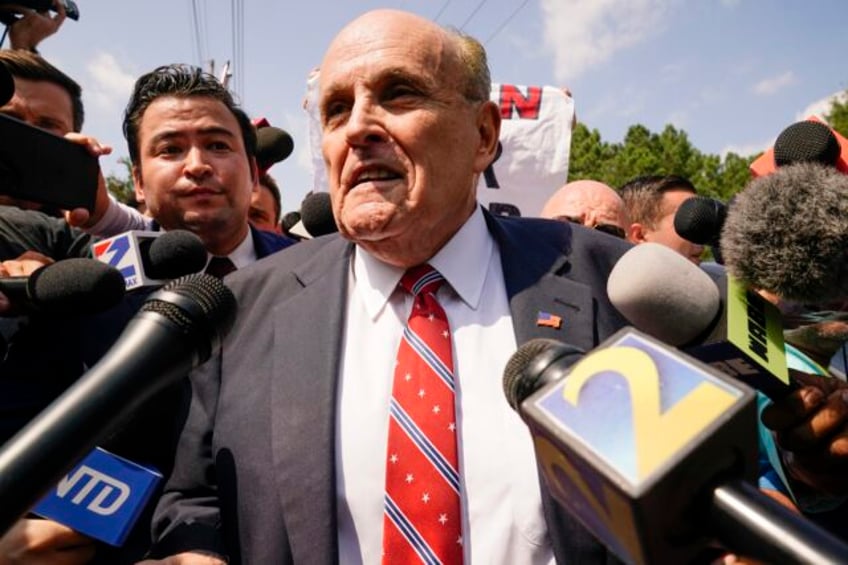 judge holds giuliani liable in georgia election workers defamation case and orders him to pay fees