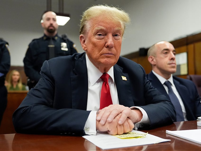 Former US President Donald Trump, center, and Emil Bove, attorney for former US President Donald Trump, at Manhattan criminal court in New York, US, on Tuesday, May 28, 2024. Trump faces 34 felony counts of falsifying business records as part of an alleged scheme to silence claims of extramarital sexual encounters during his 2016 presidential campaign. Photographer: Julia Nikhinson/AP Photo/Bloomberg via Getty Images