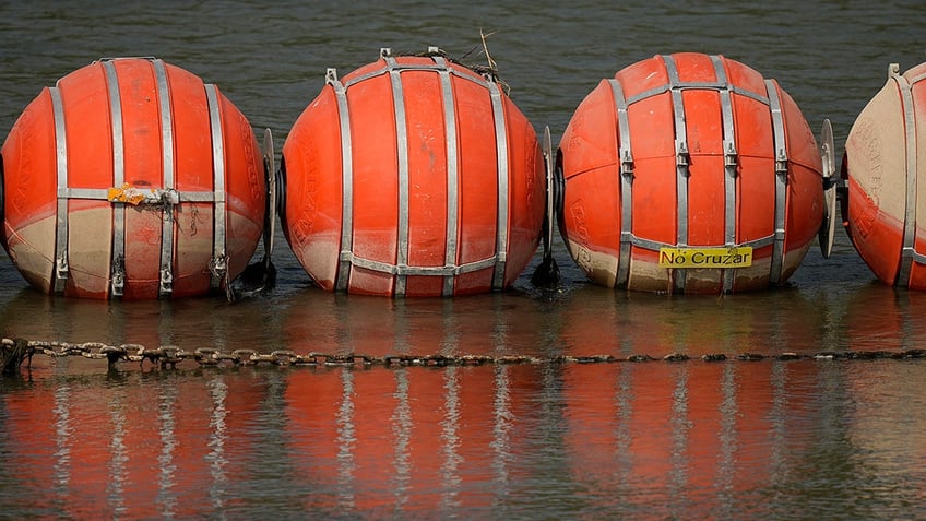 judge orders texas to remove floating buoys used to curb flow of illegal immigrants