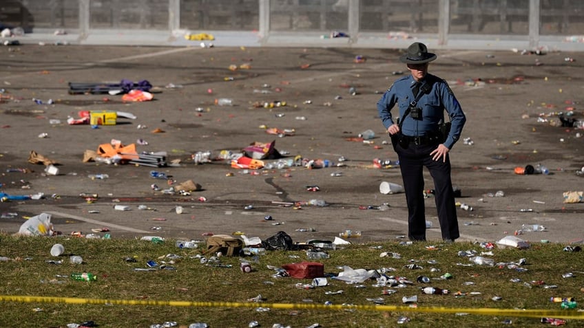 A law enforcement officer surveys the scene following a shooting at the Kansas City Chiefs' Super Bowl celebration in Kansas City, Missouri, on Feb. 14.