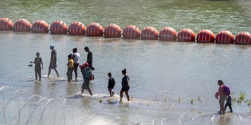 judge to decide if texas can keep buoy barrier installed along rio grande to prevent migrant crossings