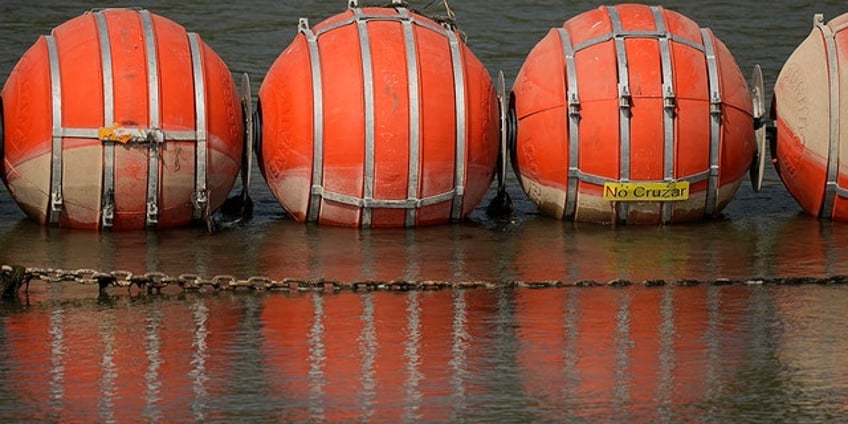 judge to decide if texas can keep buoy barrier installed along rio grande to prevent migrant crossings