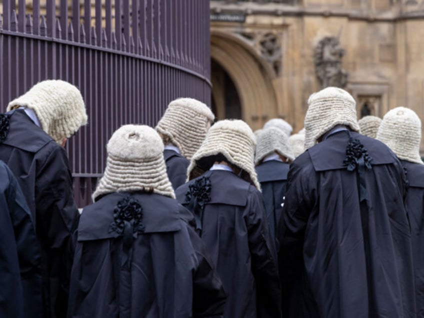 Judges and members of the King's Counsel wearing ceremonial dress leave Westminster Abbey after the traditional annual service on the 2nd of October 2023 to mark the start of the new legal year, they then head into the Palace of Westminster for a reception hosted by the Lord Chancellor, London, …