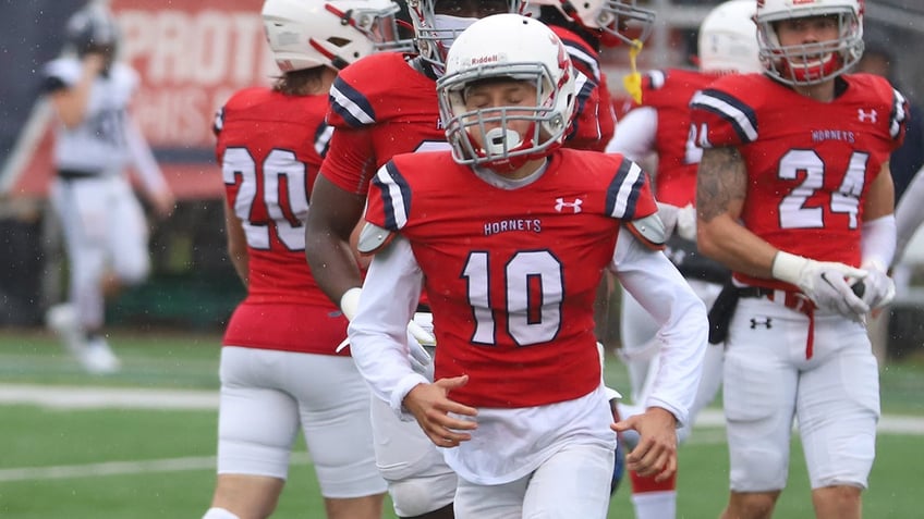 junior at division iii school becomes first woman non kicker to appear in college football game