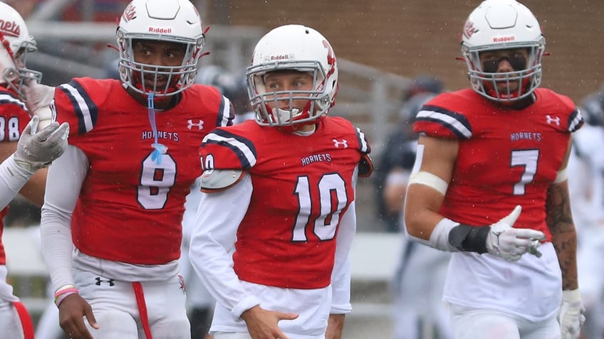 junior at division iii school becomes first woman non kicker to appear in college football game