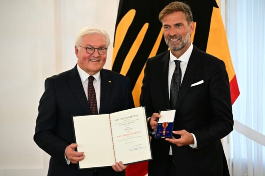 Jurgen Klopp received Germany's Federal Cross of Merit from President Frank-Walter Steinme