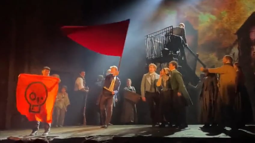 just stop oil protesters interrupt les mis performance in london called stupid people by angry crowd