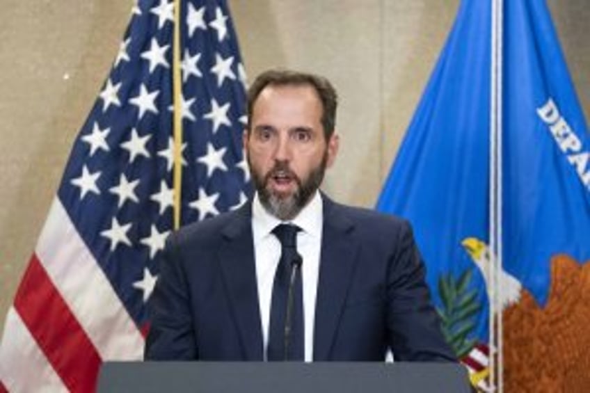 Justice Department moves to end appeal of classified documents case against Trump co-defen