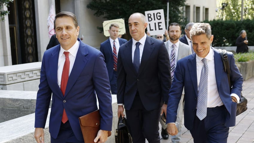 Former President Donald Trump’s attorneys (L-R) Todd Blanche, Emil Bove and John Lauro depart federal court after a hearing on Trump’s election interference case on September 5, 2024 in Washington, DC. This is the first hearing since the Supreme Court ruling on presidential immunity, ruling 6-3 that presidents have some level of immunity from prosecution when operating within their 