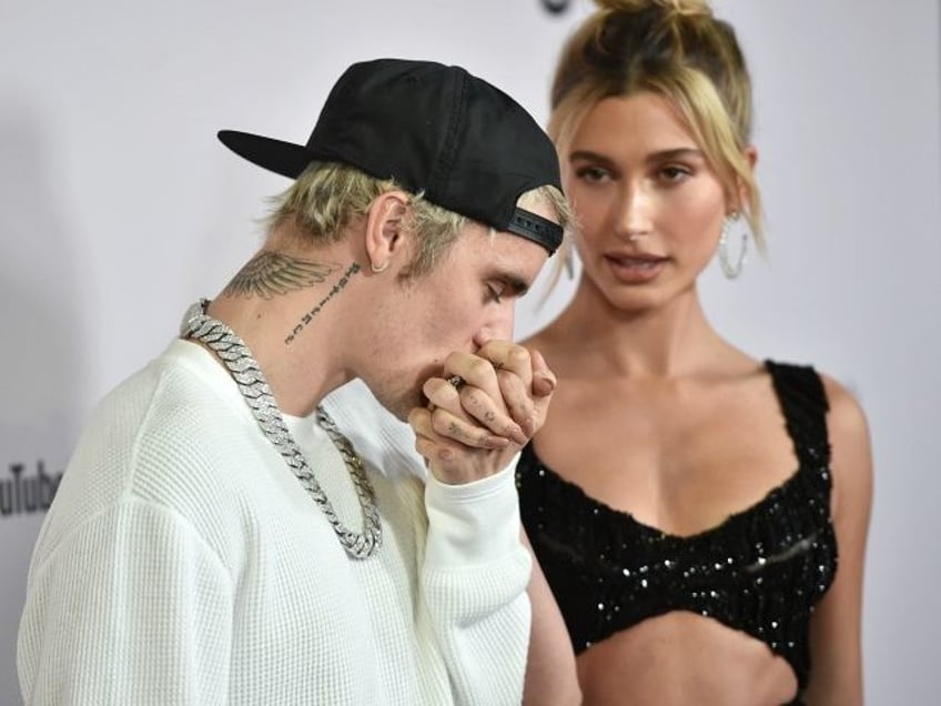 LOS ANGELES, CALIFORNIA - JANUARY 27: Justin Bieber and Hailey Bieber attend the premiere