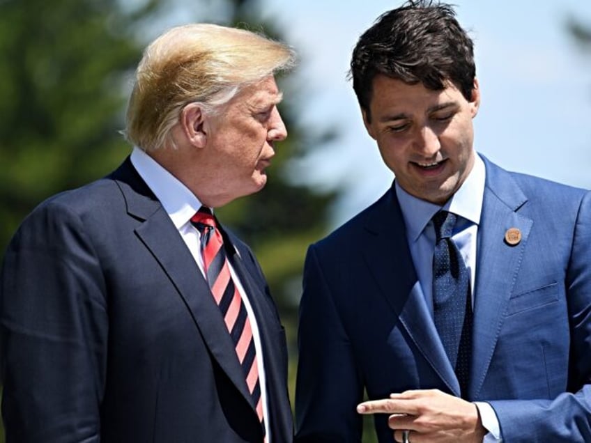 QUEBEC CITY, QC - JUNE 08: Prime Minister of Canada Justin Trudeau (R) speaks with U.S. Pr