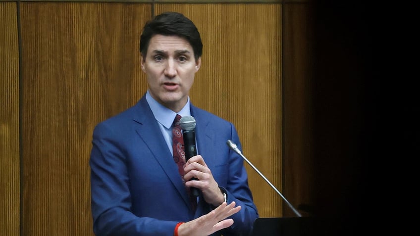 Canadas Prime Minister Justin Trudeau addresses the Liberal party caucus meeting in Ottawa