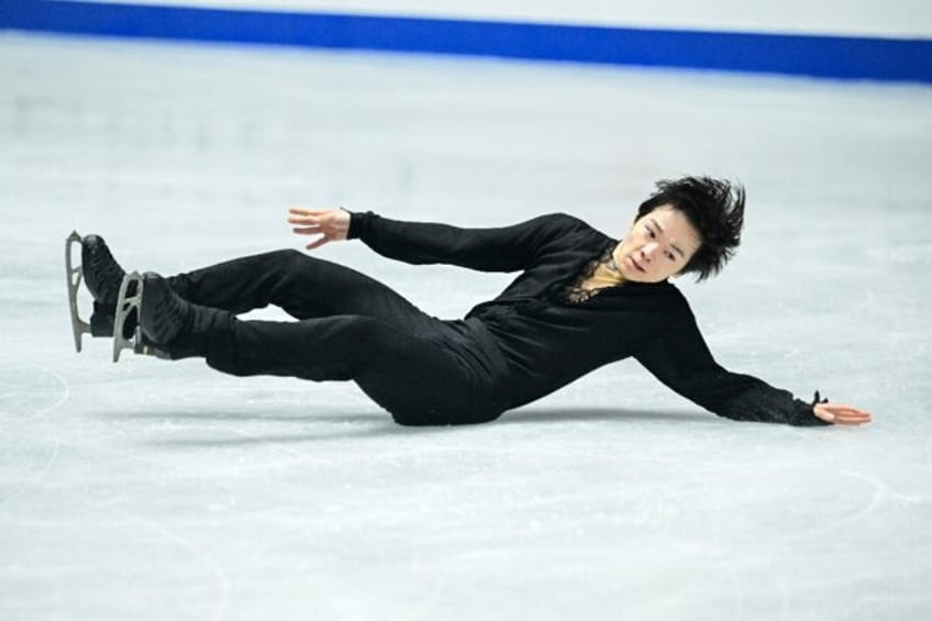 Japan's Yuma Kagiyama won the NHK Trophy title, putting an early fall behind him to take g