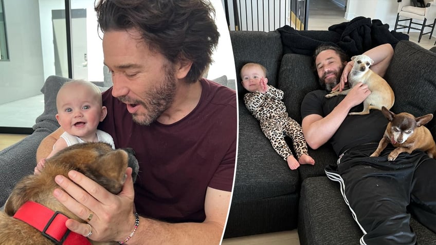 Tom Pelphrey holds his daughter Matilda while petting a dog split Tom Pelphrey and Matilda lie on the couch with two small dogs