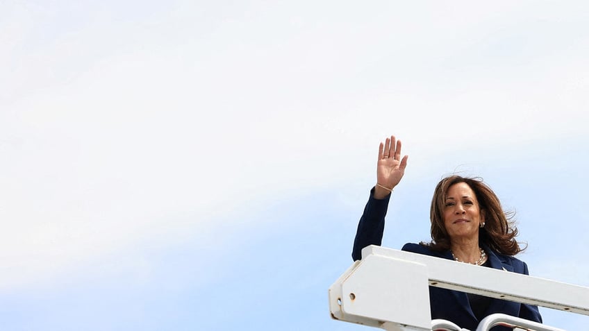 Kamala Harris disembarks Air Force Two as she arrives to campaign in Milwaukee, Wisconsin