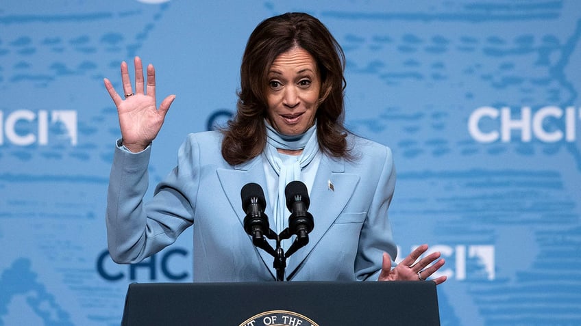 Harris on stage during Hispanic caucus event