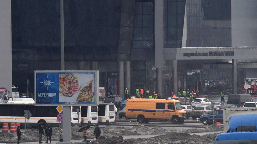 Emergency vehicles respond to Moscow concert attack scene