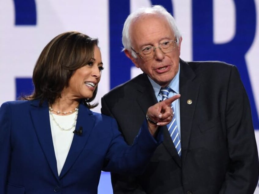 Democratic presidential hopefuls California Senator Kamala Harris (L) and Vermont Senator