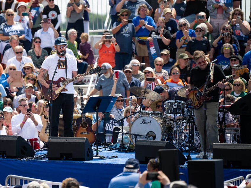 EAU CLAIRE, WISCONSIN - AUGUST 7: The band Bon Iver performs during a campaign rally for D