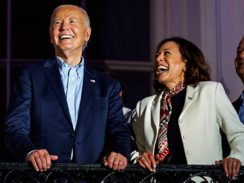 WASHINGTON, DC - JULY 04: President Joe Biden and Vice President Kamala Harris laugh as th