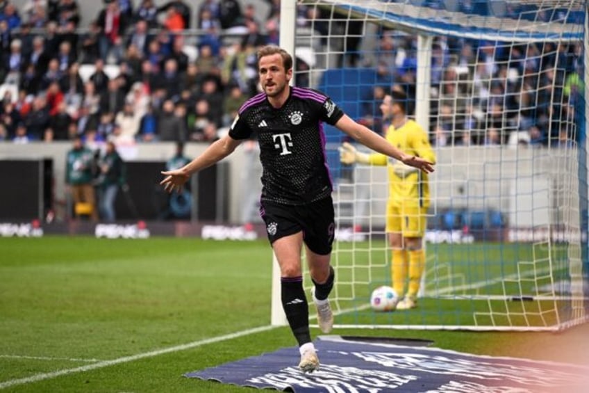 Harry Kane celebrates his goal against Darmstadt, which broke the record for the most Bund