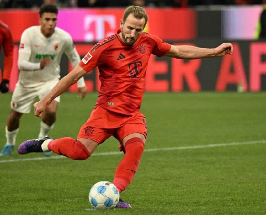 Bayern Munich forward Harry Kane scored two penalties and a header in a 3-0 win over Augsb