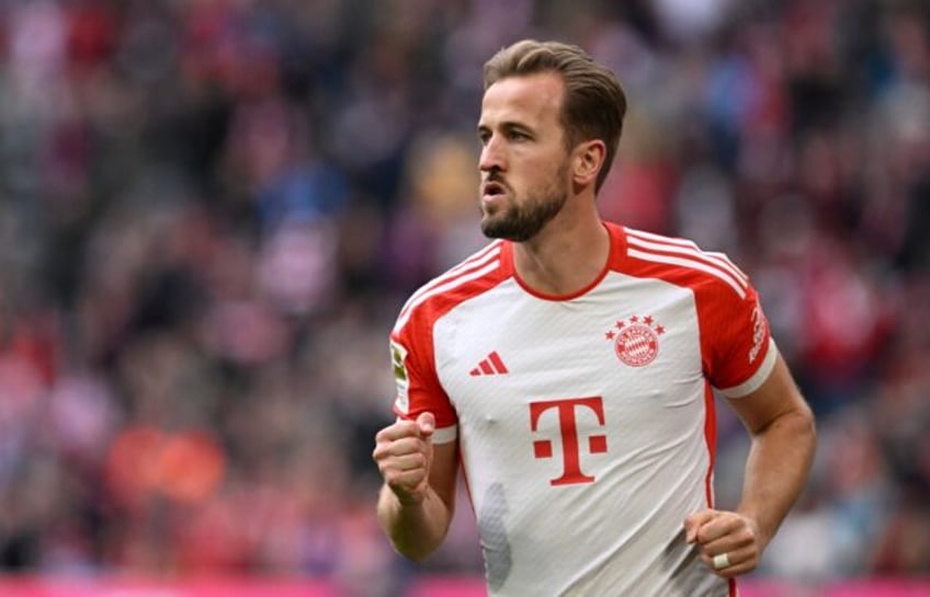 kane nets hat trick as bayern thrash darmstadt on neuers return