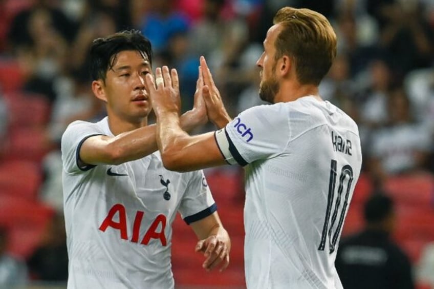 Harry Kane (right) will play against former strike partner Son Heung-min (left) in Seoul i