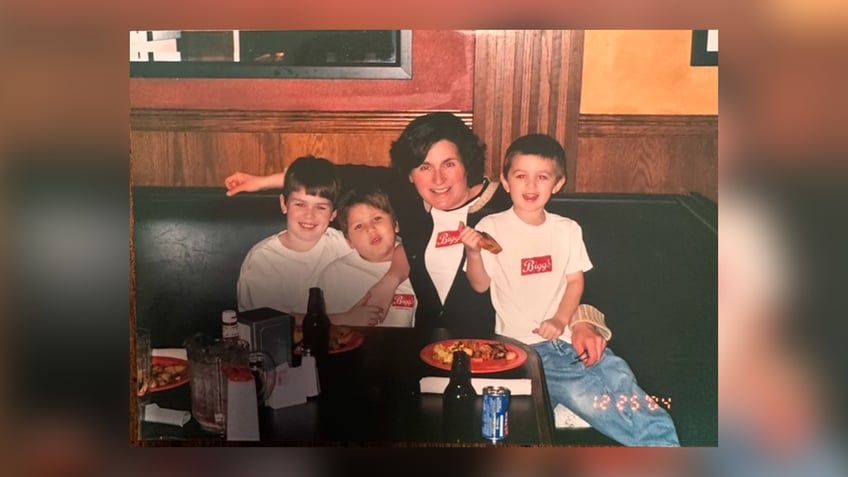 Shawn Holiday and her three sons