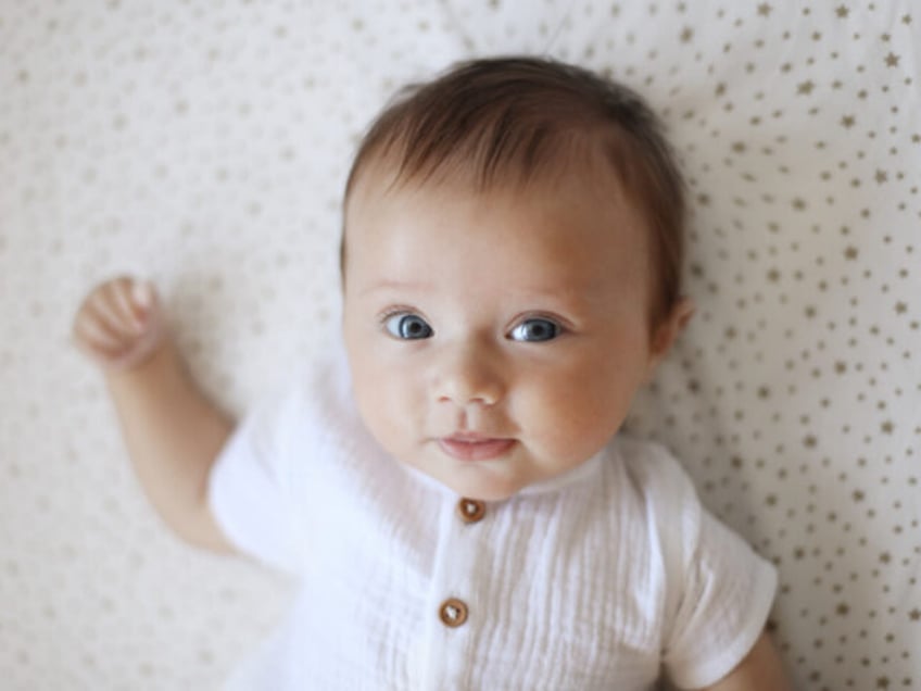 Portrait of a 4 month old baby girl - stock photo