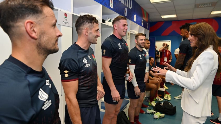 kate middleton beams as she cheers on england at rugby world cup match in france