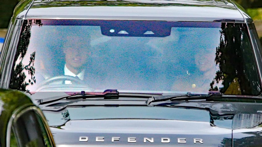 Prince William driving Kate Middleton