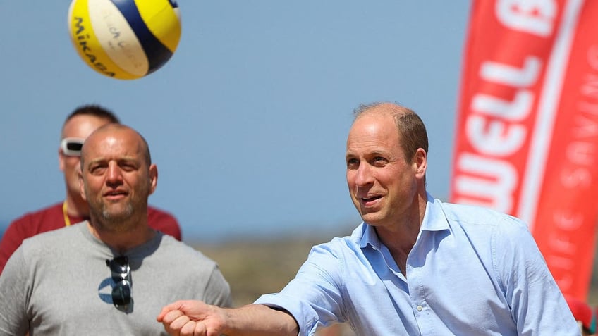 Prince William playing volleyball