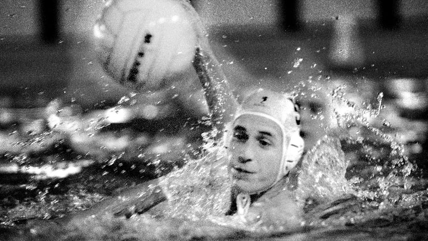 Prince William playing water polo.