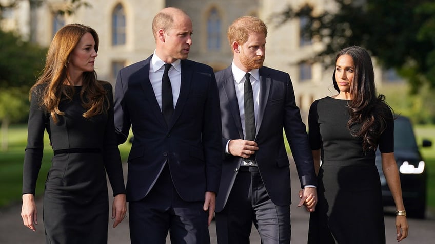 The British royals all wearing black walking in unison