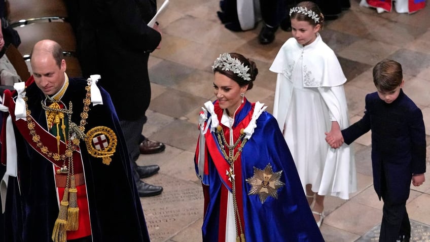 Kate Middleton in a blue, red and white Alexander McQueen dress