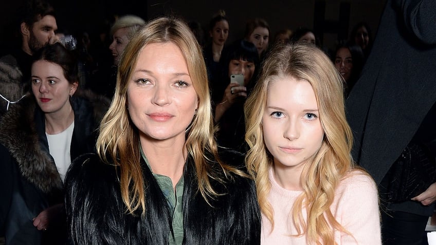 Kate Moss and Lottie Moss attend a fashion show