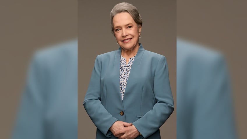 Kathy Bates sports a powder blue suit as Matlock.