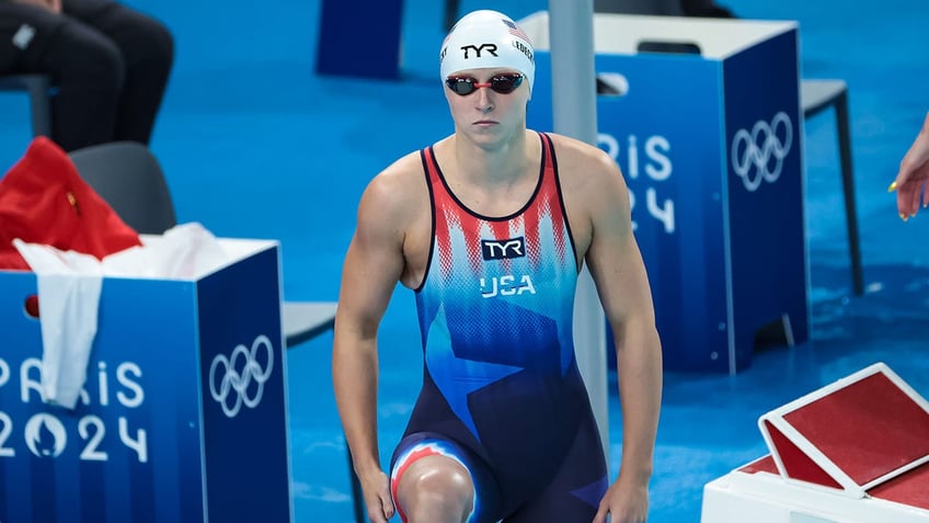 Katie Ledecky looks on