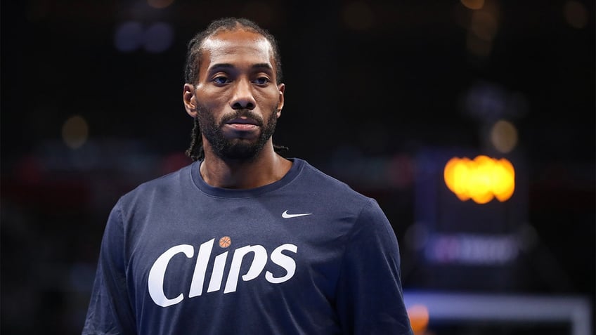 Kawhi Leonard looks on during warm ups