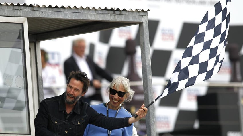 Alexandra Grant and Keanu Reeves smiling