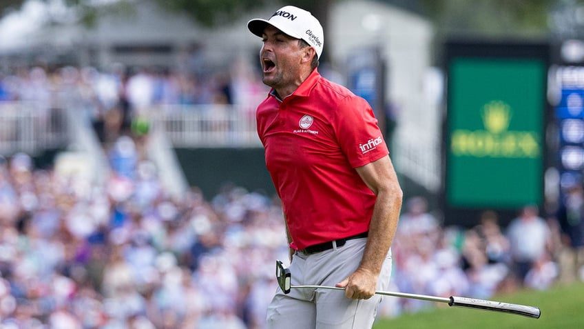Keegan Bradley reacts after hitting putt