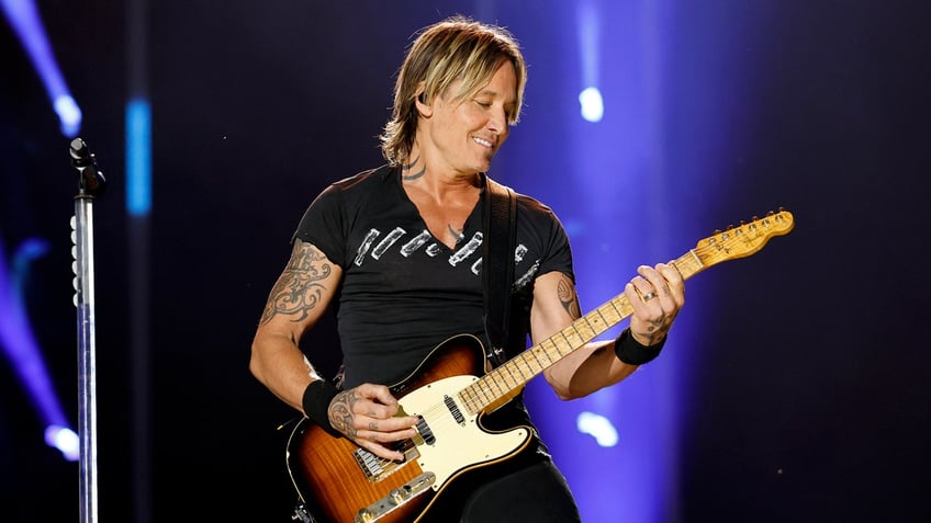 Keith Urban performing at CMA Fest